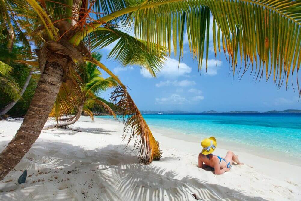 woman on sandy beach in Virgin Islands